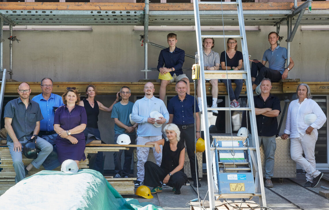 Gruppenbild TSP Architekten auf einer Baustelle